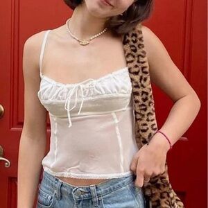 UNIF white, cute tank top, perfect for going out!
Adjustable straps
Size small